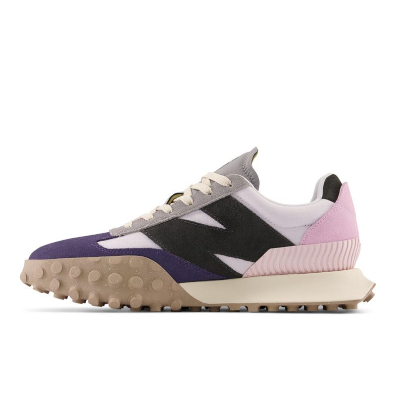 New balance clearance gris hombre rosa